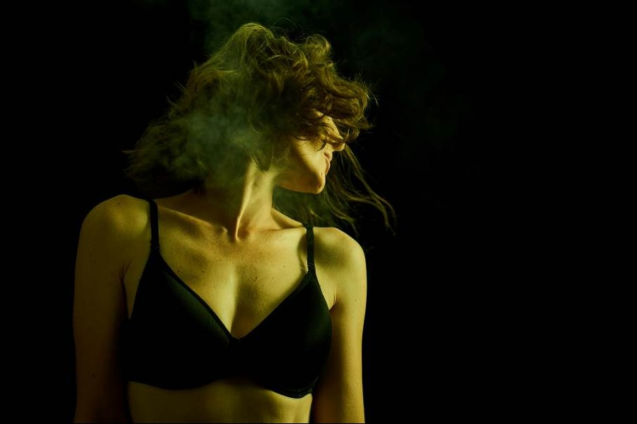 Woman Wearing Black Brassiere Doing Dance Gesture