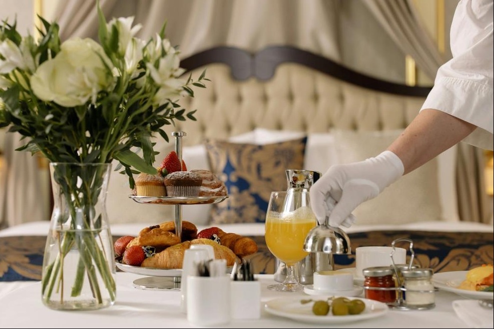 Person Checking Order From Hotel Room Service