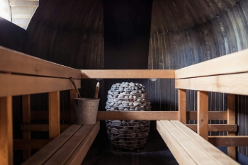 wooden benches in a steam room in a spa
